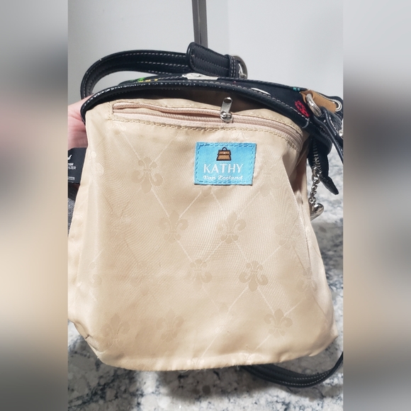 Kathy Van Zeeland Small Crossbody Featuring Colorful Charm Pins - Picture 10 of 14